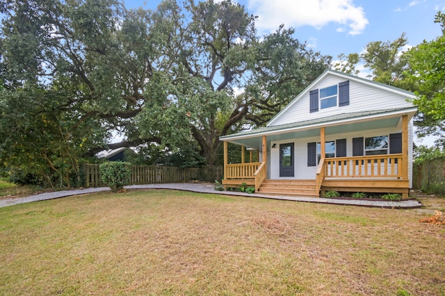 view of front facade with a porch and a front yard