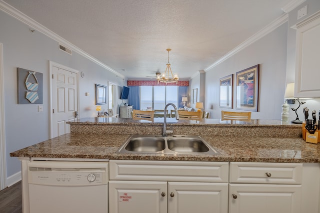 kitchen with sink, dishwasher, white cabinets, dark wood-type flooring, and crown molding