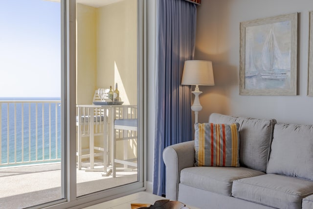 living room featuring a water view