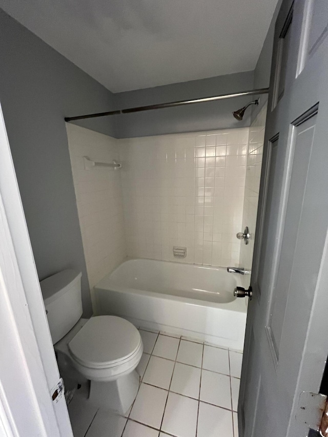 full bathroom featuring toilet, bathtub / shower combination, and tile patterned floors