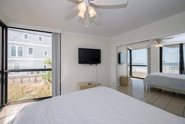 tiled bedroom featuring crown molding, access to exterior, and ceiling fan