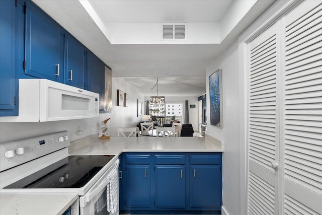 kitchen featuring a notable chandelier, blue cabinets, pendant lighting, and white appliances