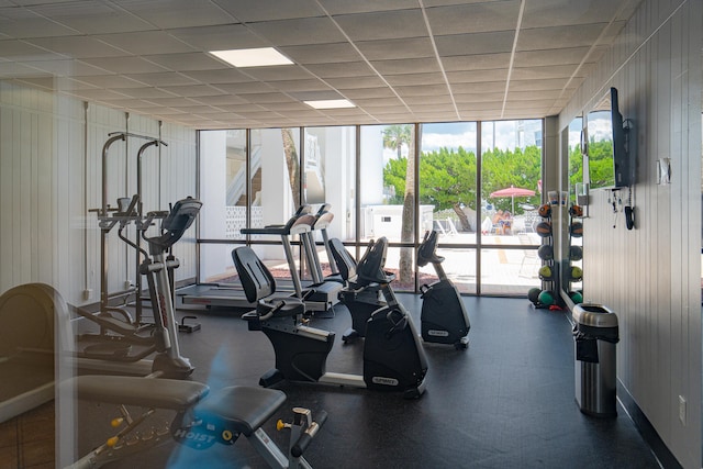 workout area featuring a drop ceiling