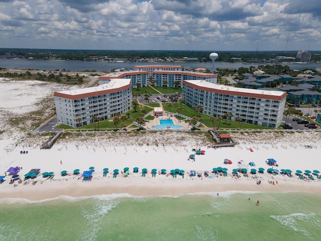 aerial view featuring a water view and a beach view