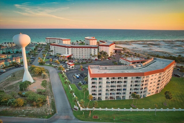 aerial view at dusk with a water view