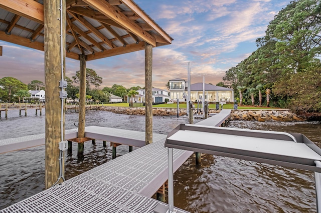 dock area featuring a water view