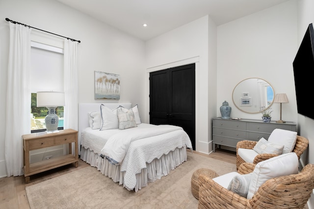 bedroom with light hardwood / wood-style flooring