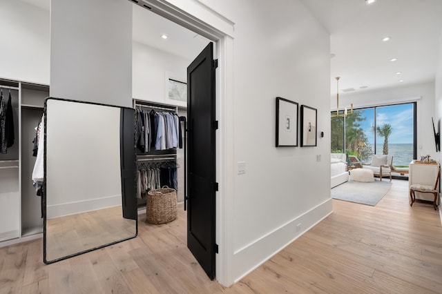 hall featuring light wood-type flooring