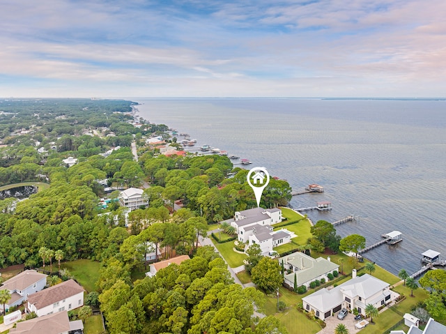 birds eye view of property featuring a water view