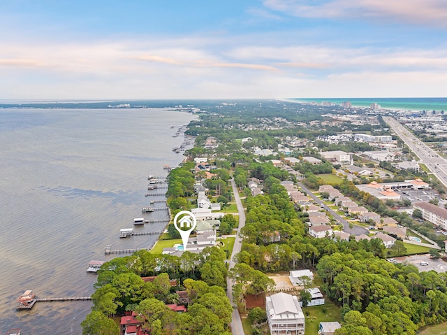 drone / aerial view with a water view