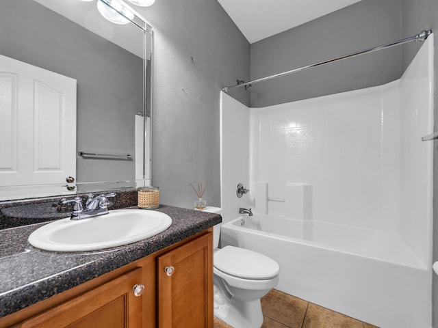 full bathroom with tile patterned floors, vanity, toilet, and bathtub / shower combination