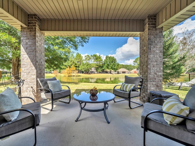 view of patio / terrace with a water view