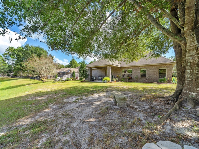 exterior space with a lawn