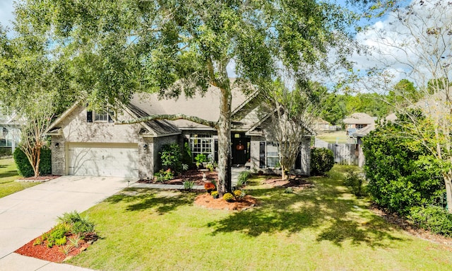 view of front facade with a front lawn and a garage