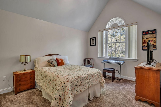 carpeted bedroom with lofted ceiling