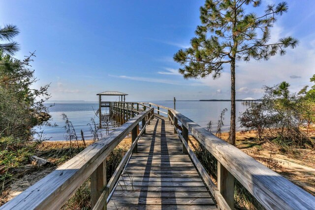dock area featuring a water view