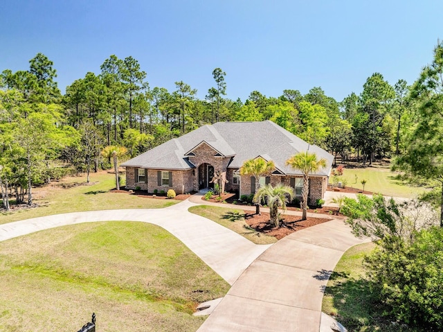 view of front of home featuring a front lawn