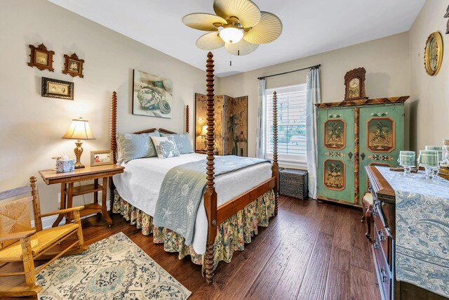 bedroom featuring dark hardwood / wood-style floors and ceiling fan