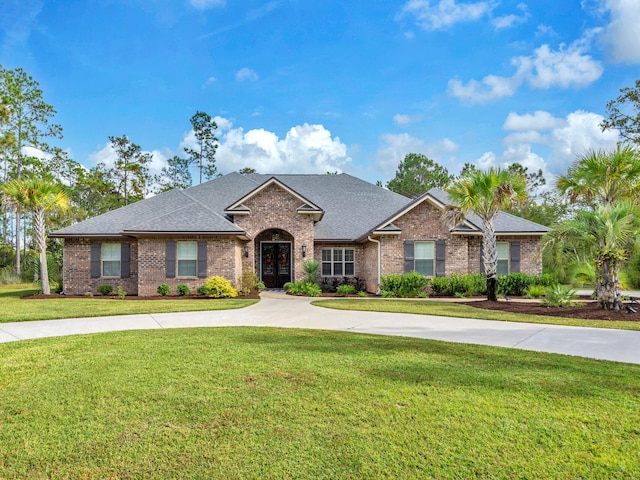 view of front of property with a front lawn