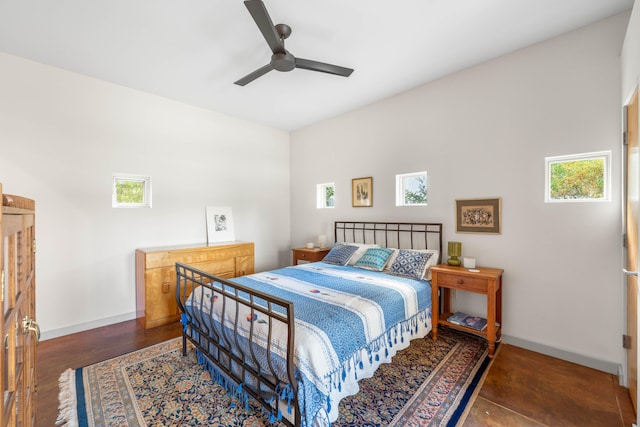 bedroom featuring dark hardwood / wood-style floors and ceiling fan