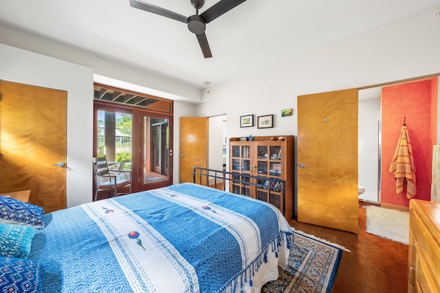 tiled bedroom featuring ceiling fan