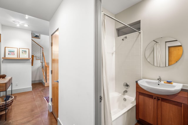 bathroom featuring vanity, tile patterned floors, and shower / tub combo with curtain