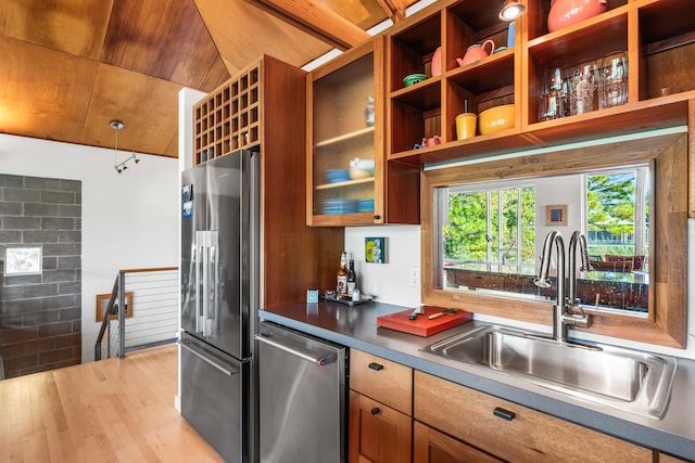 kitchen featuring lofted ceiling, wooden ceiling, sink, light wood-type flooring, and appliances with stainless steel finishes