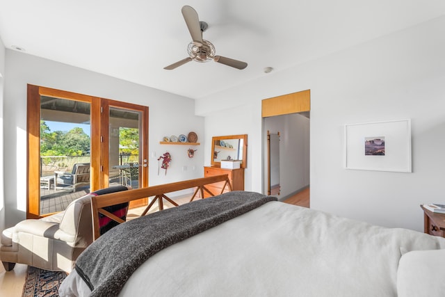 bedroom featuring light hardwood / wood-style flooring, access to exterior, and ceiling fan