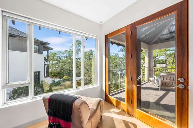 sunroom / solarium featuring plenty of natural light