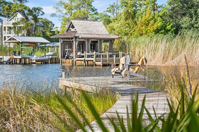 dock area with a water view