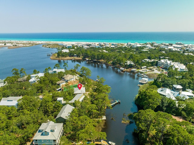 bird's eye view with a water view