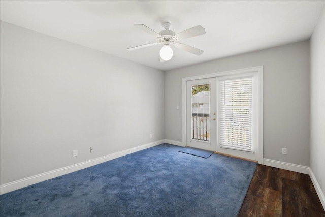 unfurnished room featuring french doors, ceiling fan, and dark hardwood / wood-style flooring