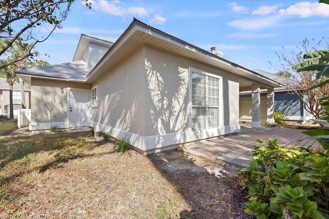 view of home's exterior featuring a patio