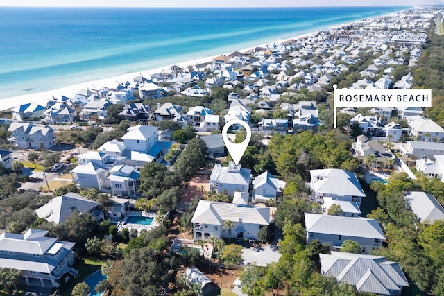 aerial view with a beach view and a water view