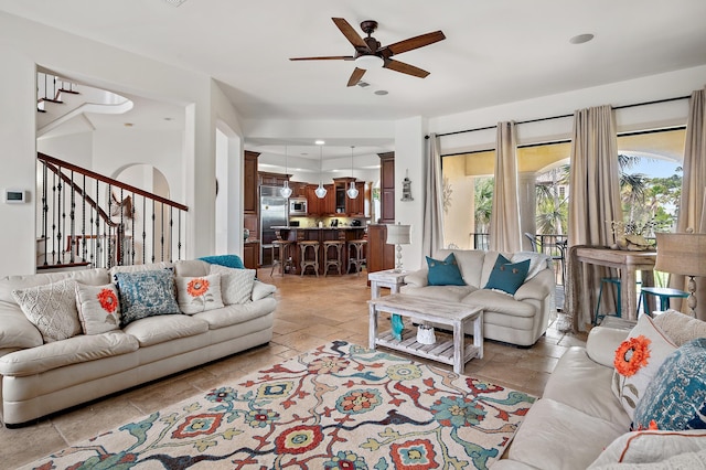 living room featuring ceiling fan