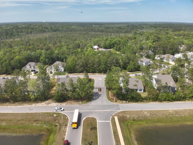 23 S J Hunters Way Lot 63, Freeport, FL 32439 - view of property location with a heavily wooded area and nearby suburban area