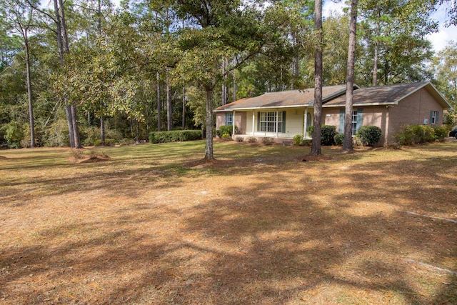 view of front of home with a front lawn