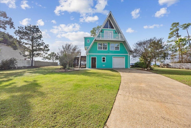 view of front of home featuring a garage and a front yard