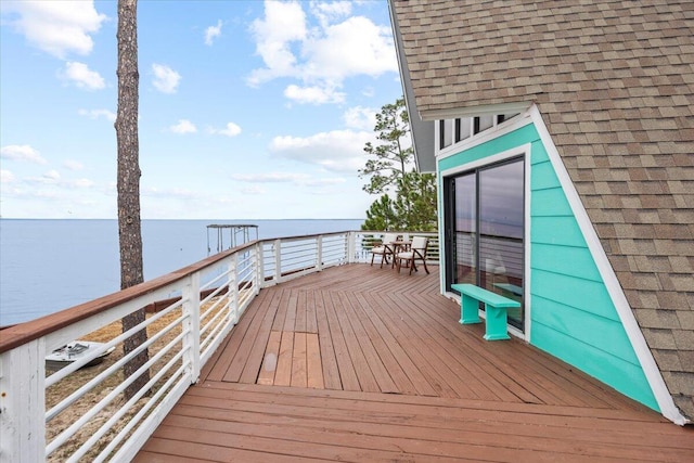 deck featuring a water view