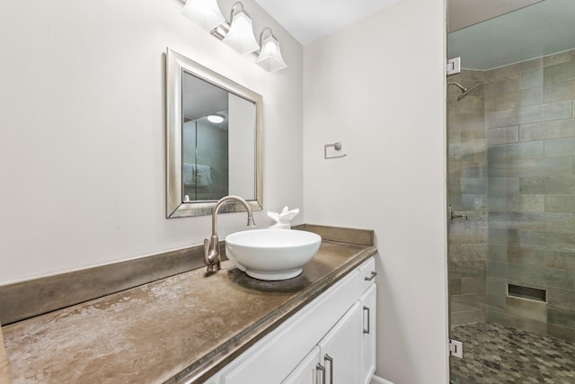 bathroom featuring an enclosed shower and vanity