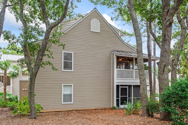 view of property exterior with a balcony