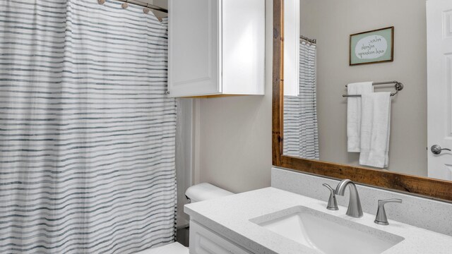 124 Village Blvd Unit 825, Santa Rosa Beach, FL 32459 - bathroom with vanity, toilet, and a shower with shower curtain