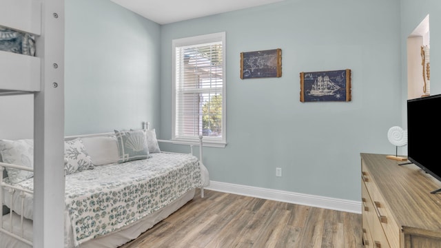 bedroom featuring hardwood / wood-style floors