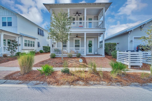 view of front facade with ceiling fan and a porch