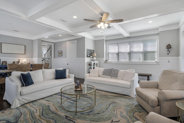 living room with coffered ceiling, ceiling fan, wood-type flooring, and beam ceiling