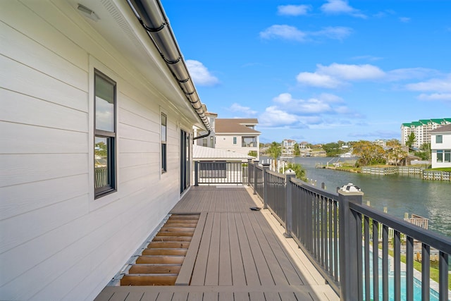 deck featuring a water view