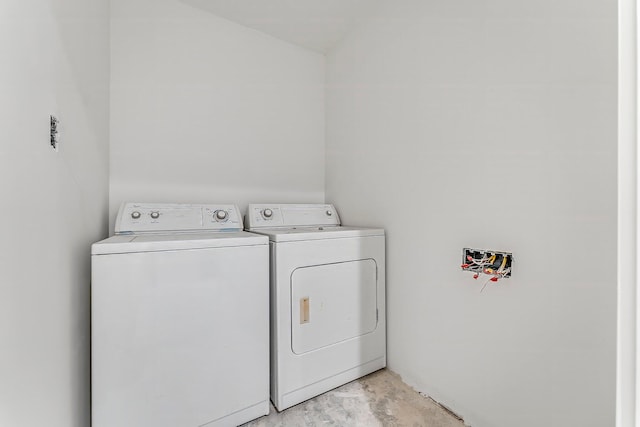 laundry room featuring separate washer and dryer