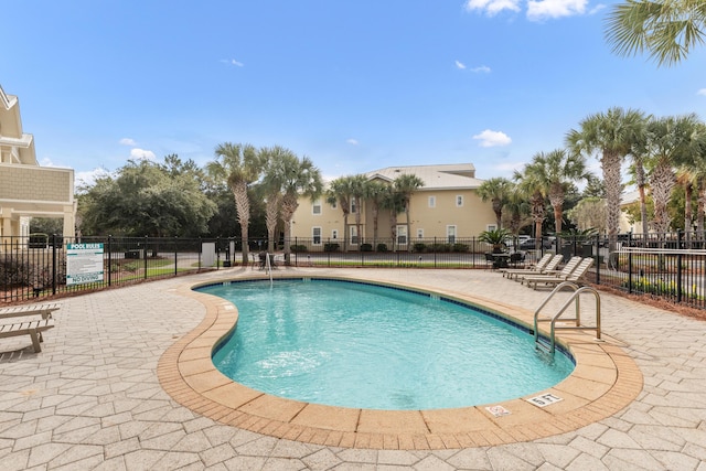 view of pool featuring a patio