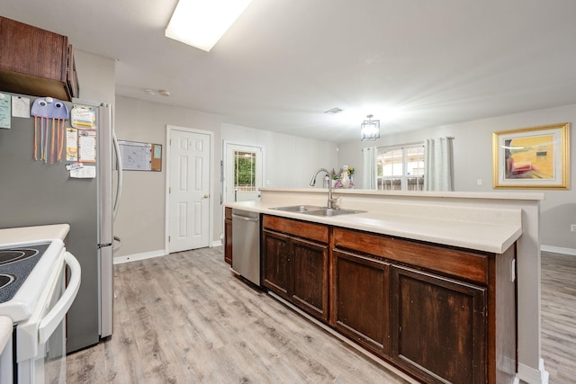 706 Brock Ave, Crestview, FL 32539 - kitchen featuring a sink, stainless steel dishwasher, light wood finished floors, and electric stove