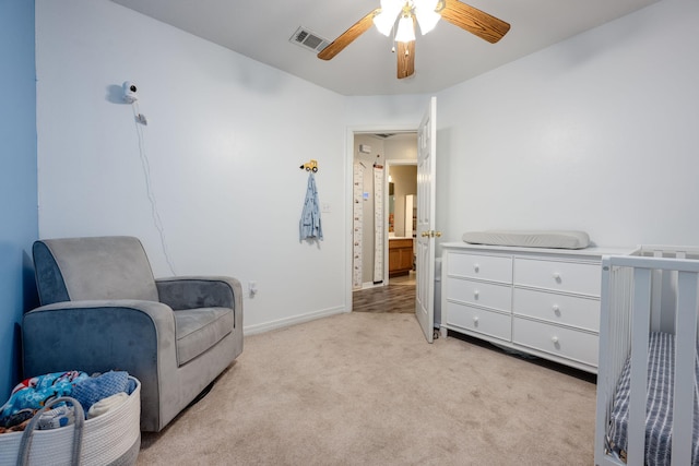 706 Brock Ave, Crestview, FL 32539 - living area featuring a ceiling fan, baseboards, and light colored carpet